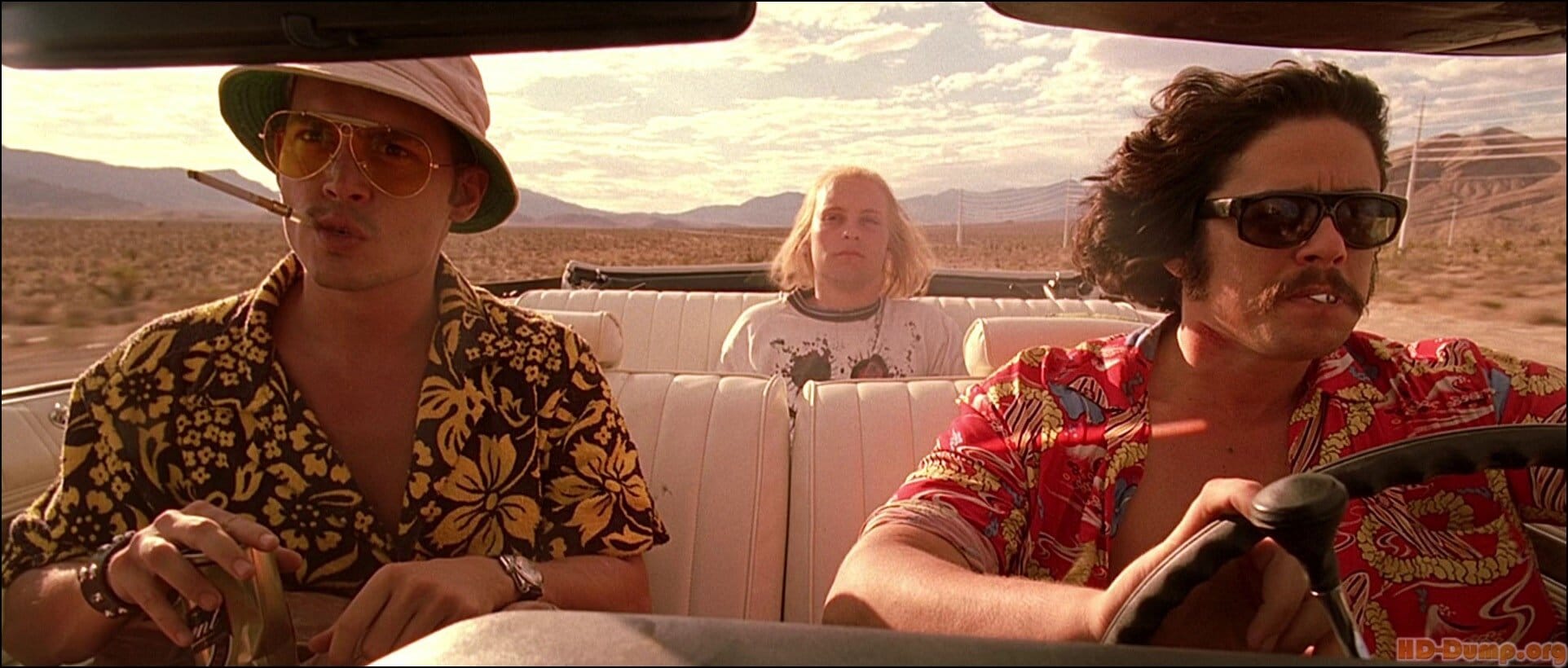 Still from Fear and Loathing in Las Vegas — two characters driving a convertible through the desert