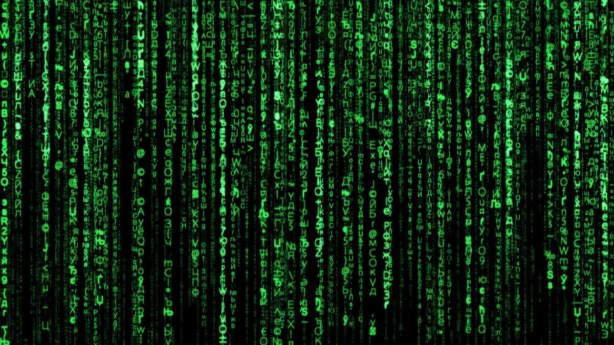 Close-up of glowing source code on a dark screen